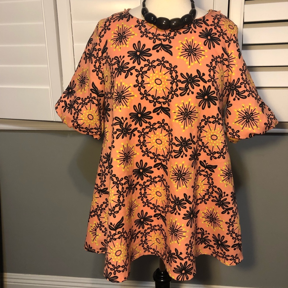 Retro peach shirt with black and yellow flowers